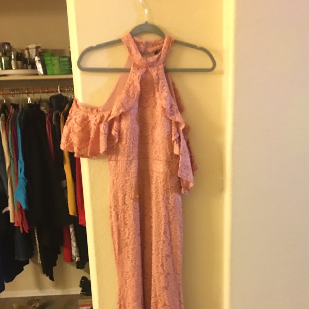 A long pink dress with a halter top